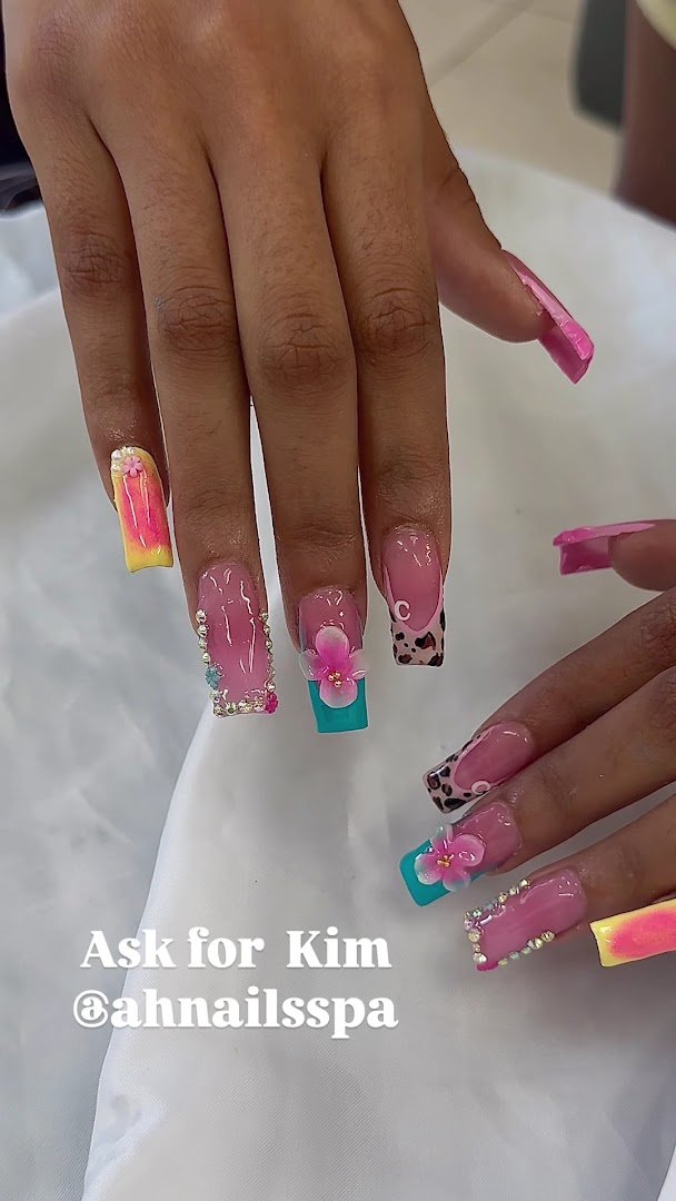 Polished nails displayed on a salon hand